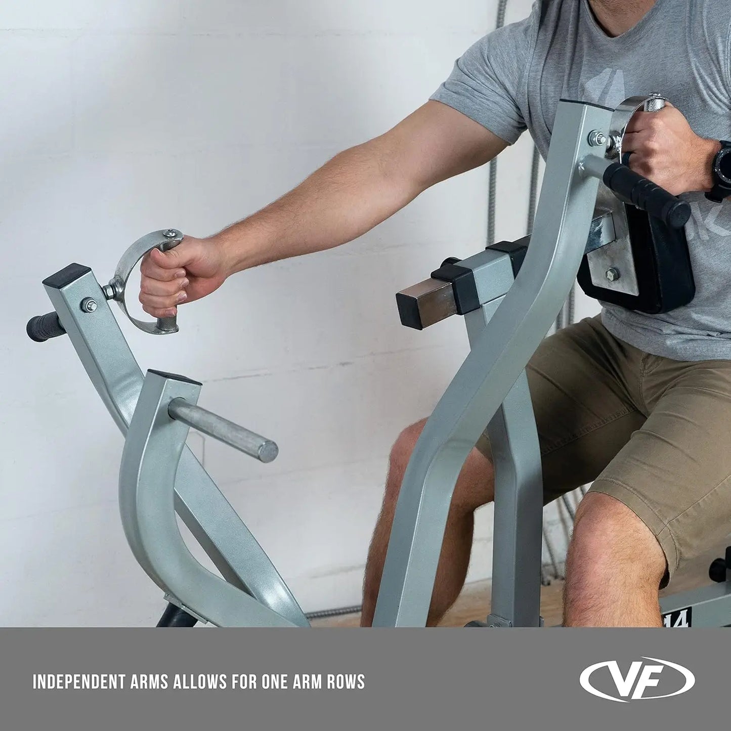 Seated Row Machine Plate Loaded With Converging Arms And Handles